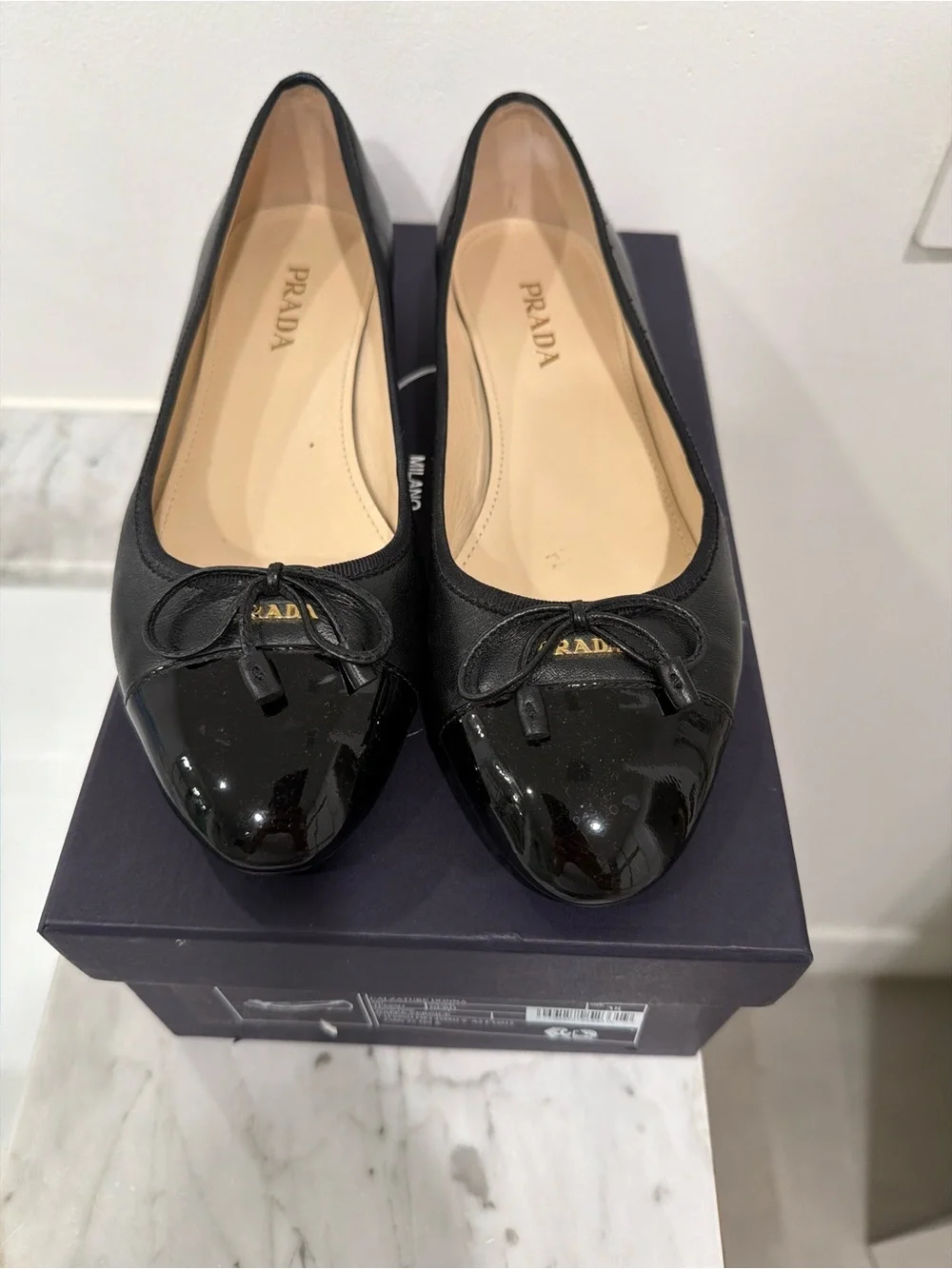 Prada Black Leather Ballet Flats with Patent Cap Toe - Picture 1 of 6